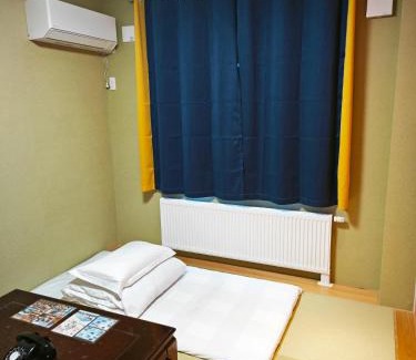 Shiraoi House | Relaxing White House Onsen Guesthouse with Hot Tub & Kitchen