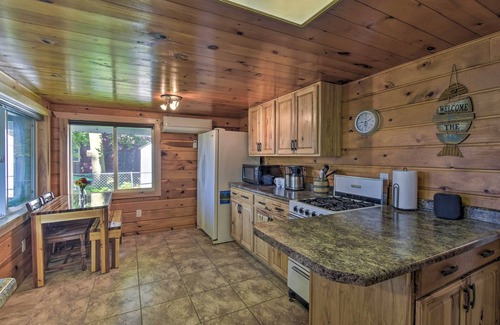 Weyauwega Cottage | Inviting White Lake Home with Patio, Fire Pit & Boat Dock