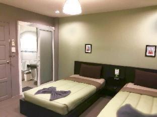 Tha Rap House | Budget-Friendly White Monkey Guesthouse with Family Amenities