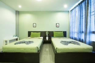 Tha Rap House | Budget-Friendly White Monkey Guesthouse with Family Amenities