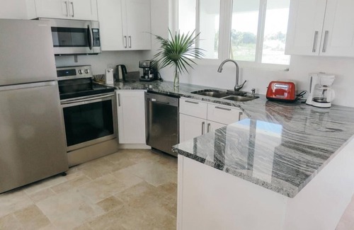 Port Howe House | Secluded White Ocean Coral: Private Beach Villa Escape