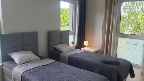 Krzyki House | Stylish White Room Wrocław Near Scenic Opatowicka Island