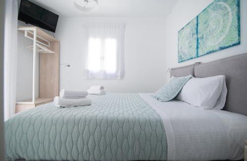 Anthousa Villa | Discover White Villas: Oceanfront Oasis with Pool Access