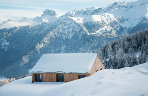 Monthey Hotel | Experience the Unique Whitepod Original with Spa and Hot Tub