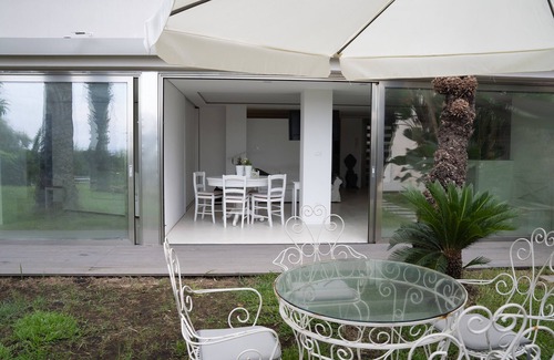 Aci Trezza House | Relaxing Whitewater Home with Oceanfront Pool and Spa