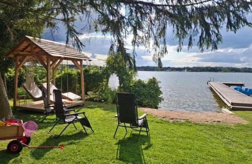 Mikolajki Villa | Relax at Widokówka 13: Oceanfront Retreat with Private Beach