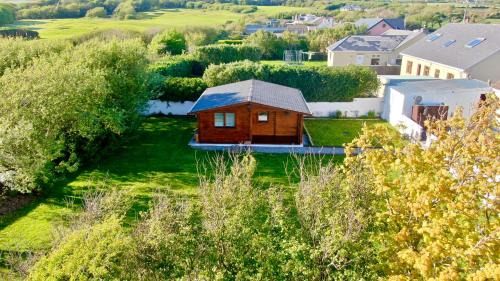 Ballyheigue Ski Chalet | Relaxing Wild Atlantic Way Cabin with Eco-Friendly Amenities
