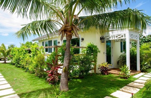 North Palmetto Point House | Oceanfront Wild Orchid 4 Bedroom Home with Kid-Friendly Kitchen