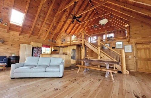 Alpine Cabin | Experience Wild Wind Lodge: Woodwork & Scenic Views Await