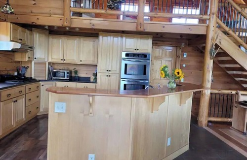 Alpine Cabin | Experience Wild Wind Lodge: Woodwork & Scenic Views Await