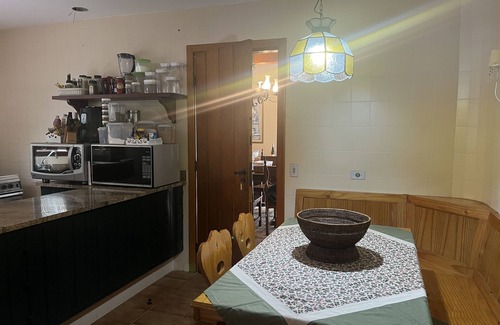 Vila Poran House | Rustic Wilderness Home with Child-Friendly Kitchen Amenities