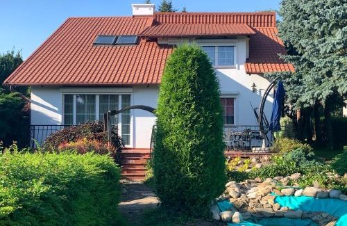Zurawica Villa | Relaxing Retreat with Pool, Hot Tub & Scenic Garden Views