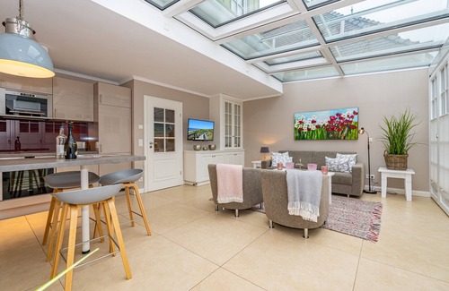 Westerland Apartment | Discover Uthland: Bright Oceanfront Retreat with Pool