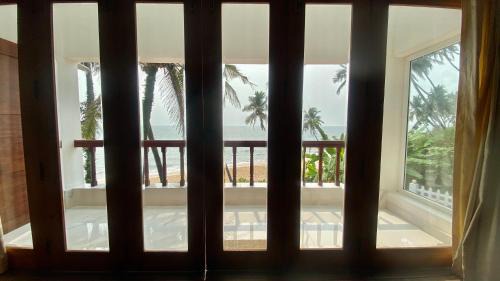 Kannur House | Beachfront Bliss at Willo Stays - Relax with Ocean Views