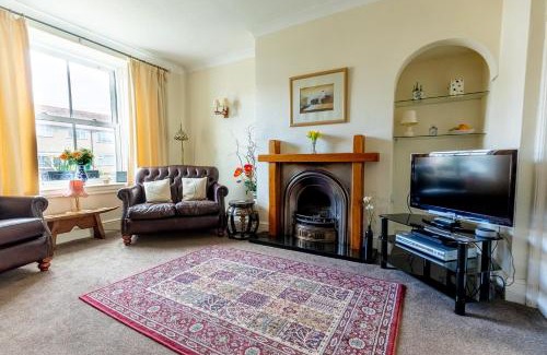 Penrhyn Bay House | Seaside Haven: Willow Cottage with Snowdonia Access