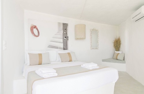 Artemonas Hotel | Discover Windmill Bella Vista: Pool, Spa & Family-Friendly