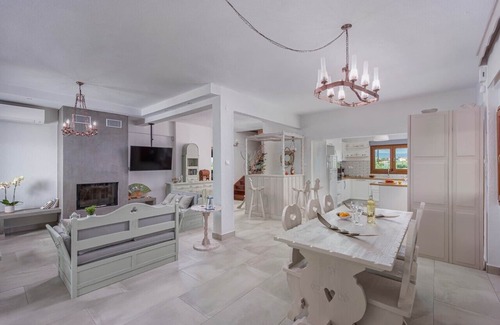 Kalivia Poliyirou Villa | Beachfront Windmill Villa with Private Garden & Ocean View