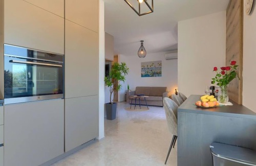 Pjescana Uvala Apartment | Oceanfront Retreat: Wing 77 by Interhome, Rated 10/10