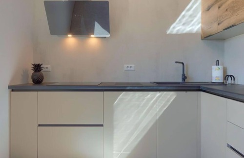 Pjescana Uvala Apartment | Oceanfront Retreat: Wing 77 by Interhome, Rated 10/10