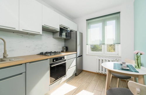 Stare Miasto District Apartment | Cozy 1 Bedroom with Balcony & Child-Friendly Amenities