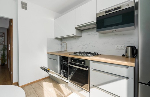 Stare Miasto District Apartment | Cozy 1 Bedroom with Balcony & Child-Friendly Amenities