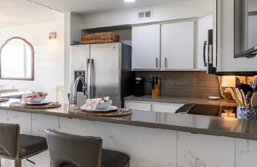 Villa Sabine Condo | WINTER RATES AND SUNSETS are the best! Live at the beach for 600 per week!