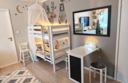 Rovaniemi House | Winter Woods family room