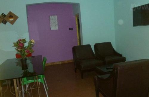 Asaba Cabin | Relaxing Room at Wise Penny Suites and Spa with Pool Access