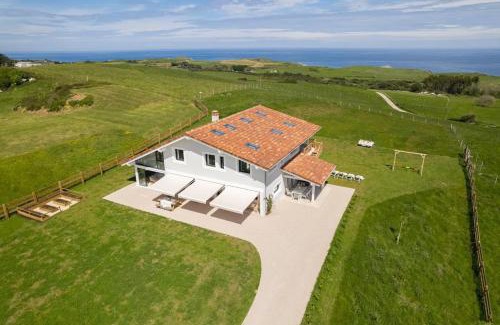 Prellezo Villa | Elegant Villa with Heated Pool and Ocean Views