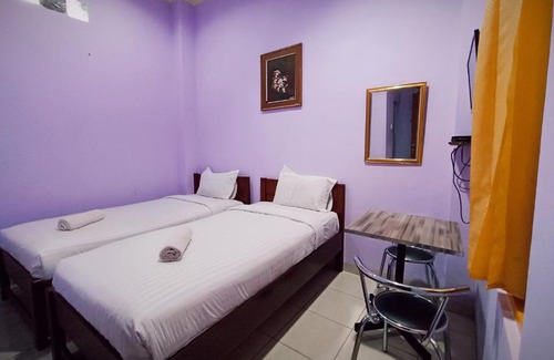 Padang Hotel | Discover Wisma Mutiara: Family-Friendly & Accessible Stays