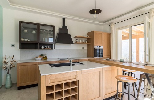 Tignale Apartment | Glicine: Breathtaking Lake Views and Serene Garden Retreat