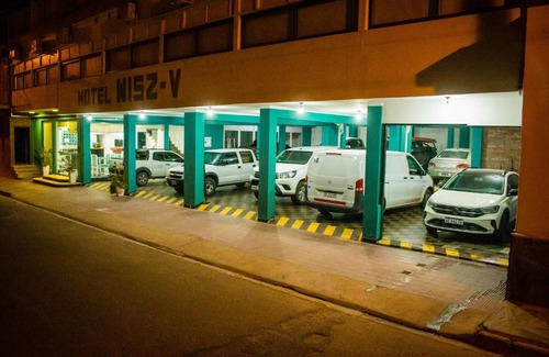 Belen Hotel | Discover WISZ-V: Family-Friendly Stay with Breakfast Included