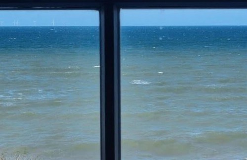 Sheringham Apartment | Discover Breathtaking Sea Views in Our Family-Friendly Stay