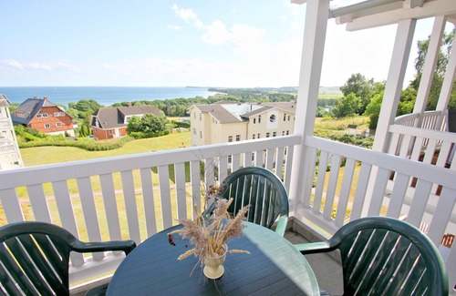 Gohren Apartment | Inviting Sea View Apartment with Pool and Sauna Access