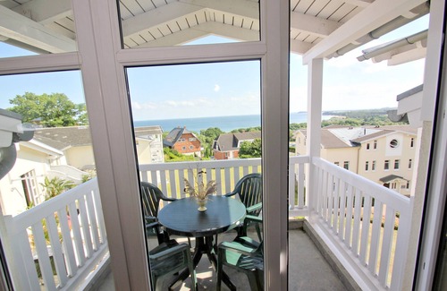 Gohren Apartment | Inviting Sea View Apartment with Pool and Sauna Access