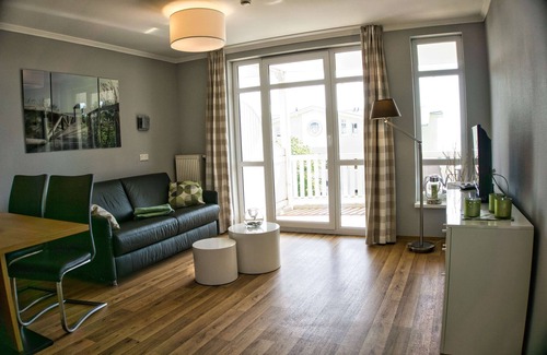Gohren Apartment | Sea View Apartment 22: Pool, Sauna & Balcony Retreat