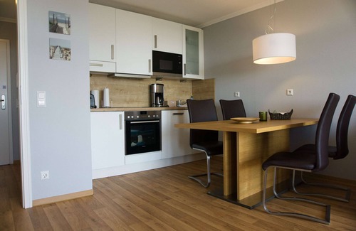 Gohren Apartment | Sea View Apartment 22: Pool, Sauna & Balcony Retreat