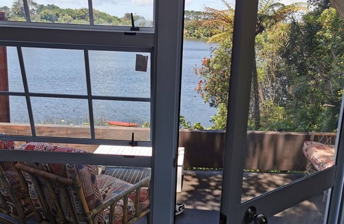 Opunake Cottage | Prime Location: Lakefront Retreat, Steps from the Beach