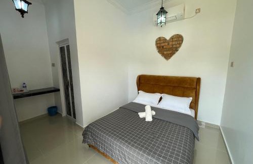 Kemasik Cabin | Budget-Friendly WIWI Village with Pool & Family Amenities