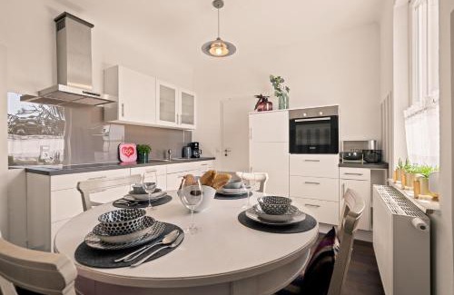 Meckenbeuren Apartment | Stay at the Historic Bahnhof with Balcony Near Spieleland