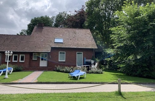 Butjadingen Condo | Cozy Retreat Steps from the North Sea with Scenic Grounds