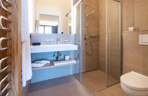 Warth Apartment | Wolfegg Appartement: 4-Star Haven with Café & Spa