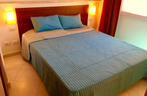 Canneddi Resort | Inviting Apartment at Residence Cala Rossa with Pool Access