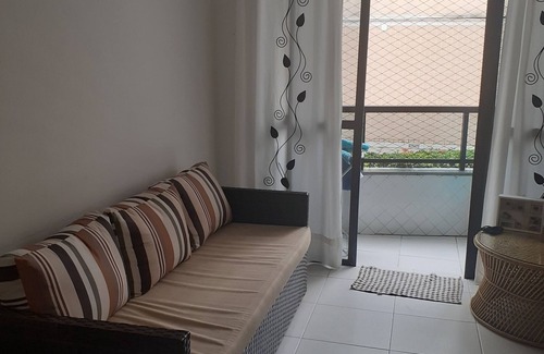 Centro Condo | Beachfront Getaway in Bertioga with Ocean View Amenities