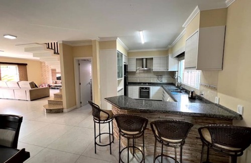 Enseada House | Cozy Beachfront Townhouse with Spa and Pet-Friendly Options
