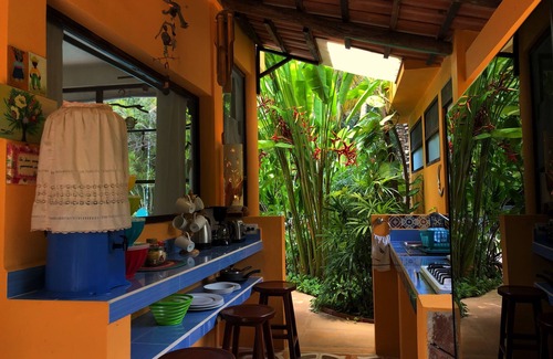 Alfredo V. Bonfil House | Escape to a Bungalow in Cancun's Lush Jungle Retreat