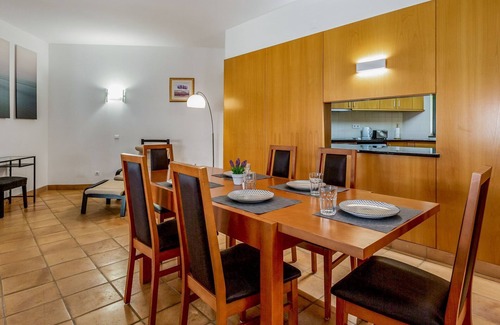Telheiro Apartment | Bright Flat with Big Patio and Pool by LovelyStay