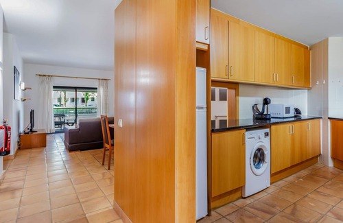 Telheiro Apartment | Bright Flat with Big Patio and Pool by LovelyStay