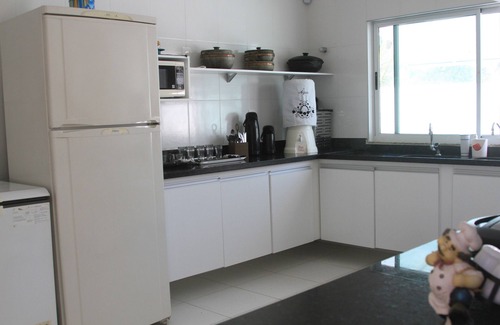 Caueira House | Idyllic Getaway at Caueira Beach with Oceanfront Pool