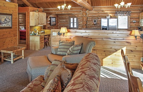 Oslund House | Beautiful Sand Lake Retreat with Expansive Porch & Spa